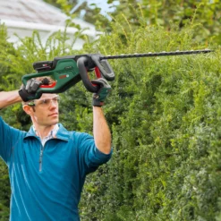 Bosch Power For All 18V 550mm UniversalHedgeCut 18-55 Cordless Hedge Trimmer -Gardens and Outdoor bosch power for all 18v 550mm universalhedgecut 18 55 cordless hedge trimmer4059952558776 06i bq